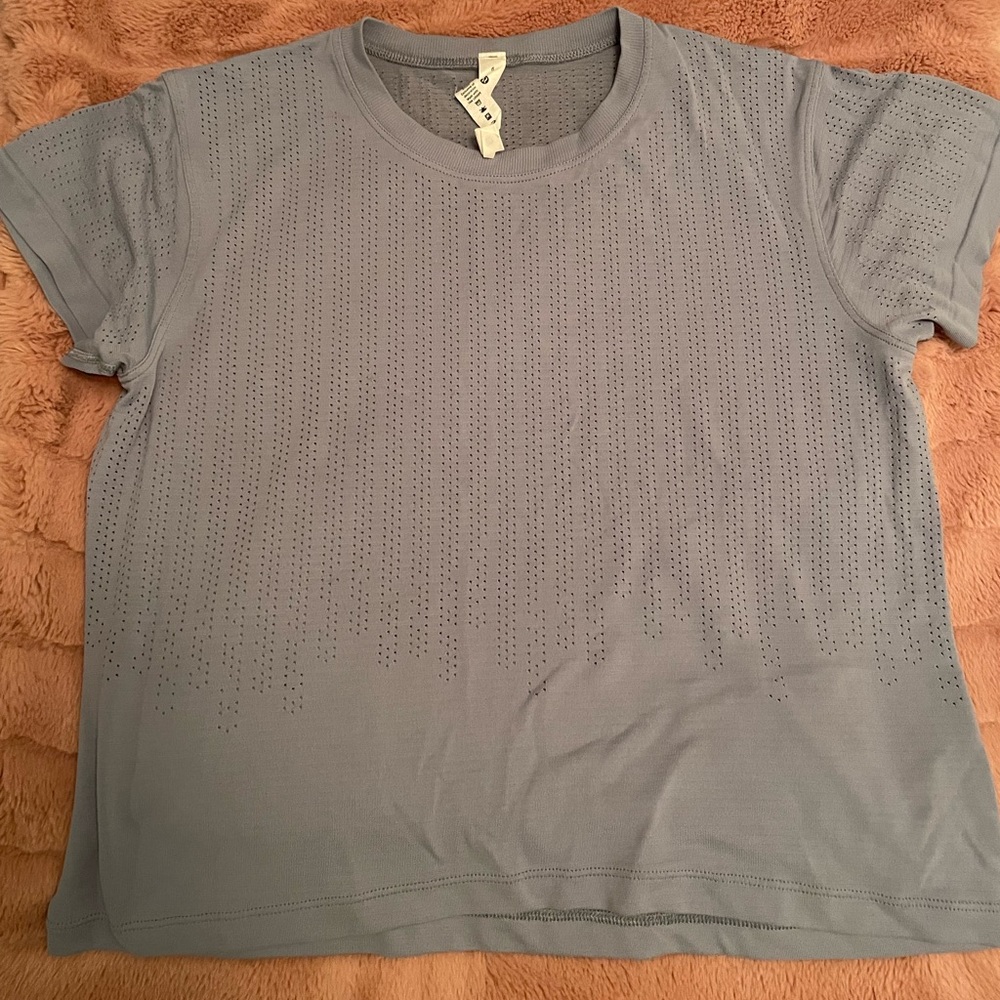 EUC light blue Lululemon top size 6
